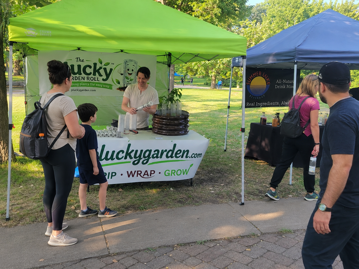 Plucky Garden Roll booth and product demonstration at Minneapolis Parks Markets